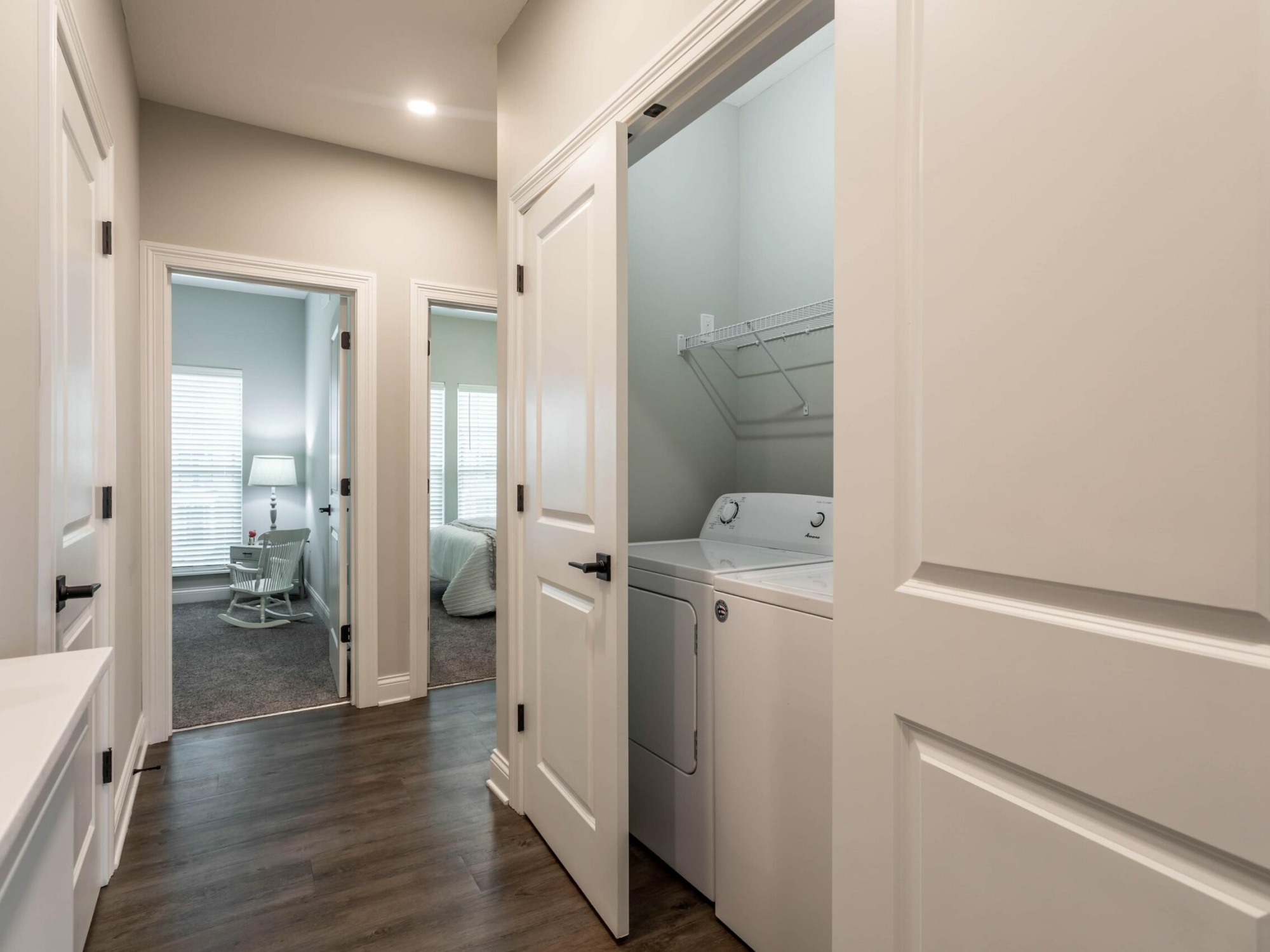 A laundry room with a washer and dryer.