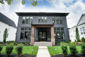 The exterior of a home with a black exterior.