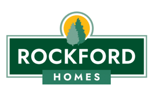 Rockford Homes logo featuring two pine trees in front of a yellow circle, with "ROCKFORD" in large white letters and "HOMES" below on a green rectangle.
