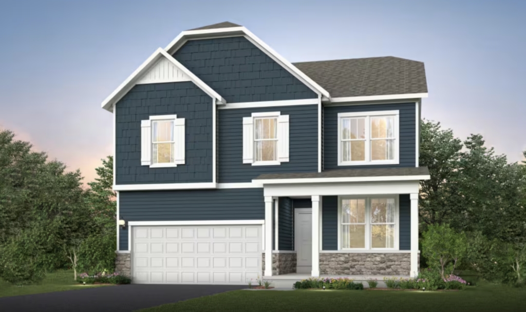 Two-story suburban house with blue siding, white trim, a double garage, front porch, and landscaped yard, set against trees and a clear sky.